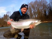 Ilya and rainbow when fishing for Huchen, Slovenia