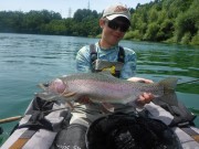 Guy and Rainbow, Slovenia on lake