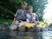 Tom and Jan with monster Marble trout Slo.